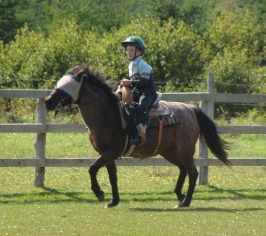 Aiden and Ella cantering